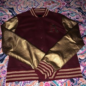 A maroon & gold letterman jacket.